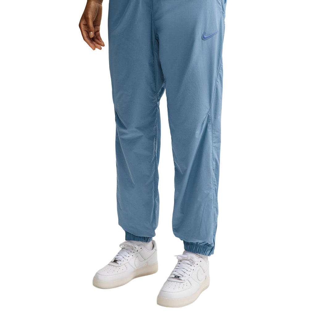 + NOCTA Northstar Nylon Track Pants 'Work Blue'